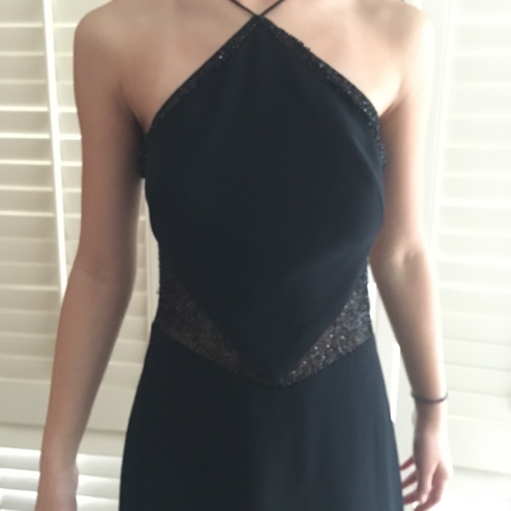 Dazzling  evening gown.  For a small frame.